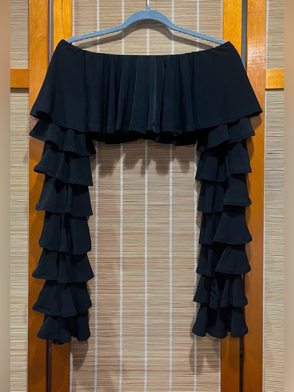 Kikiriki black long sleeved ruffle crop top, size S